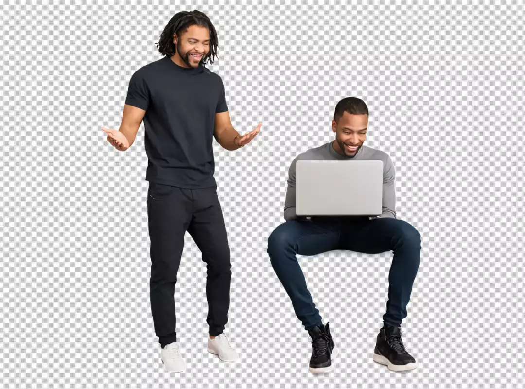 Two Happy Young African American Men Engaging with Laptop on White Background