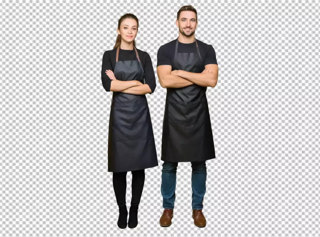 Smiling Professional Man and Woman in Black Aprons Posing Confidently with Arms Crossed