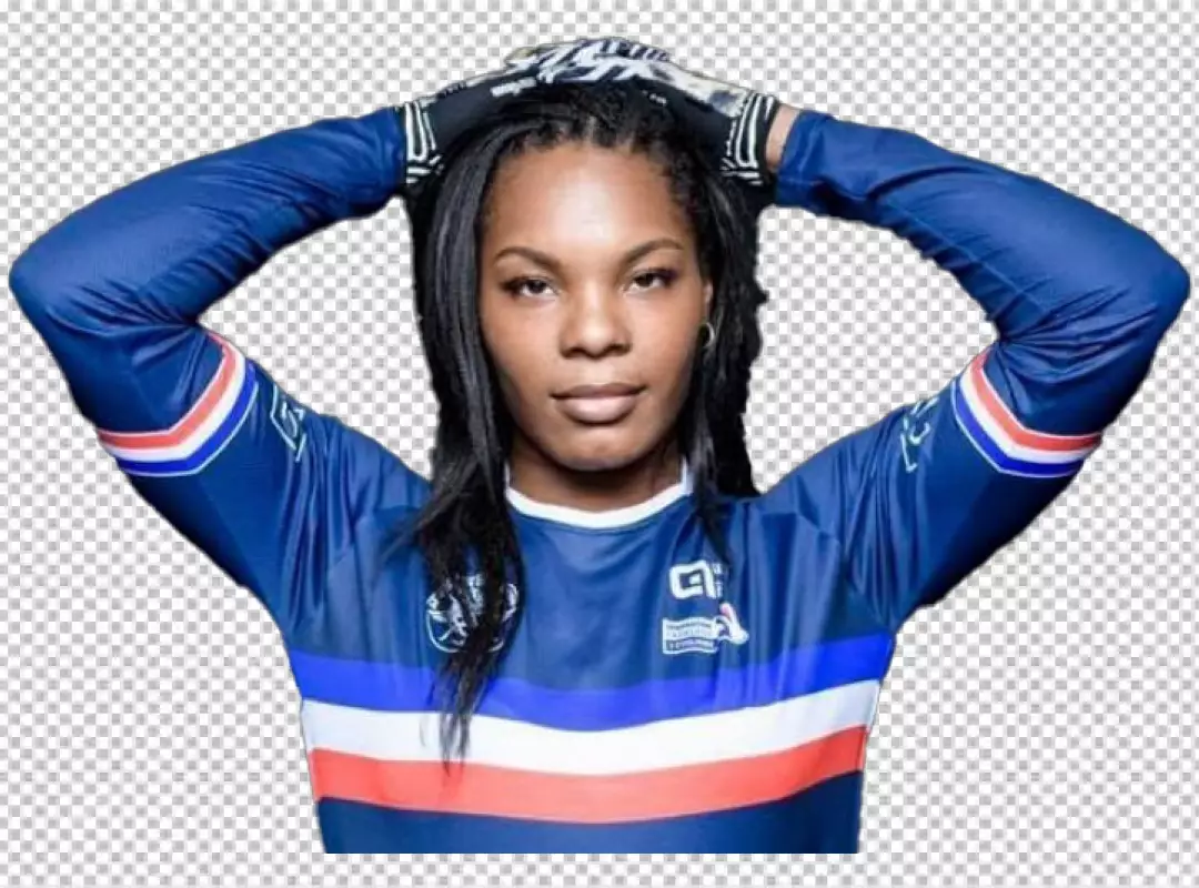 Confident Female Soccer Player in Blue Jersey and Goalie Gloves Posing