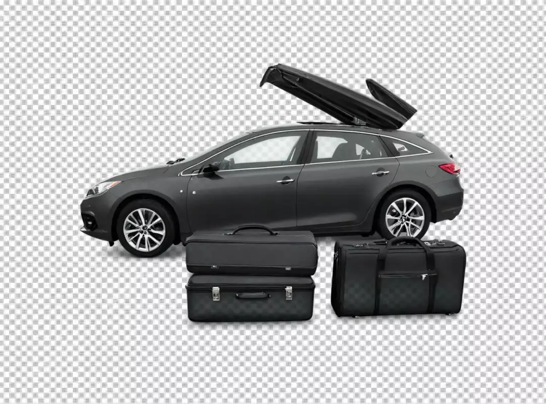 Modern grey station wagon with open roof cargo box and suitcases ready for travel