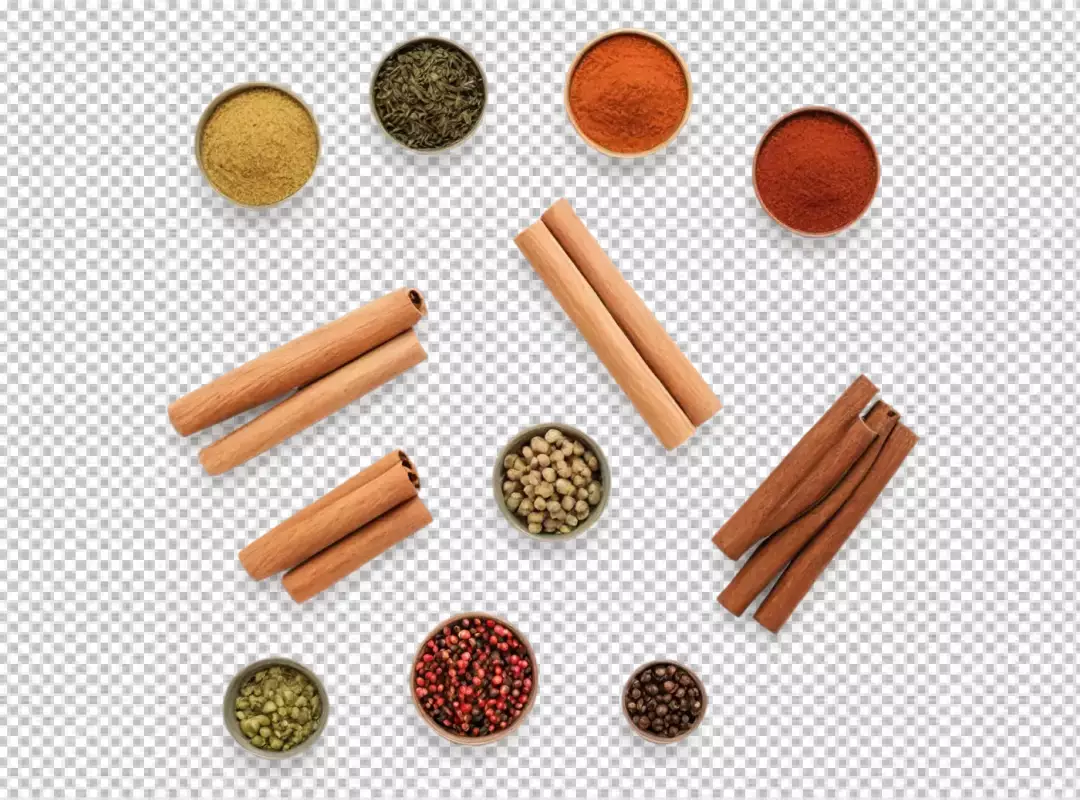 Assortment of Aromatic Spices, Herbs, and Cinnamon Sticks in Bowls on White