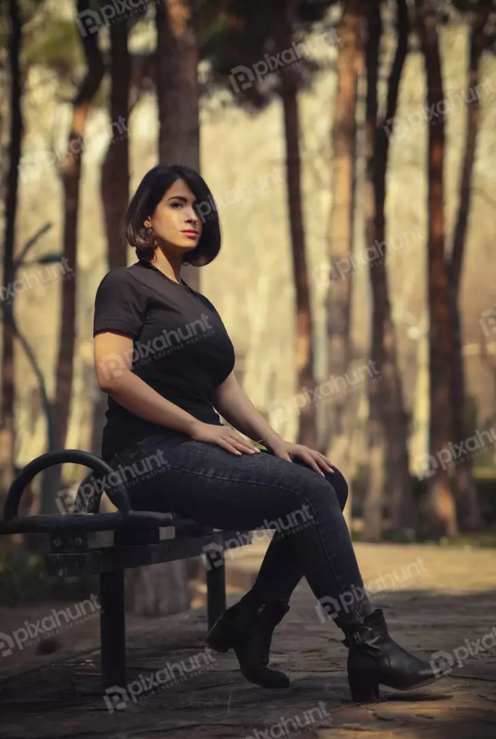 Free Premium Stock Photos Casual Woman in Black Sitting on Park Bench