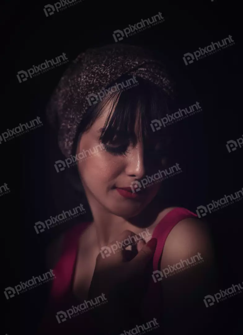 Free Premium Stock Photos Intense Spotlight Portrait of Woman with Headwrap