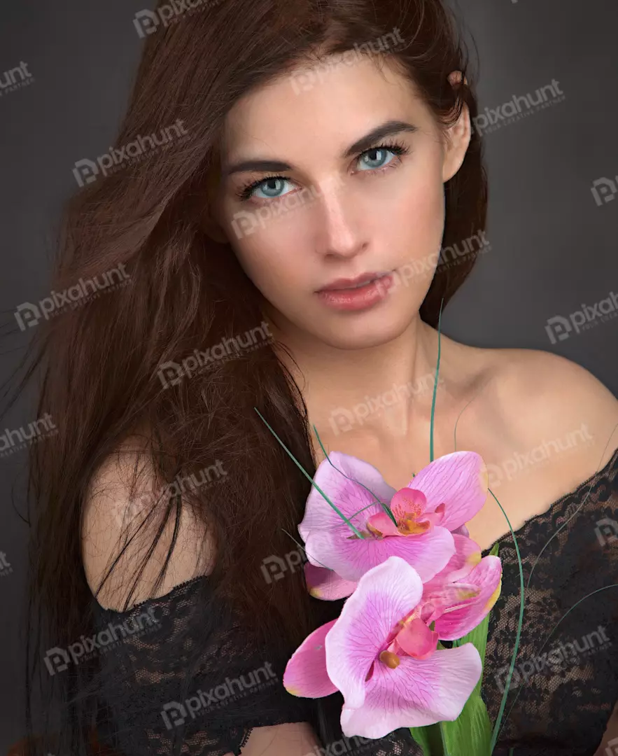 Captivating Woman with Striking Blue Eyes and Delicate Pink Orchids