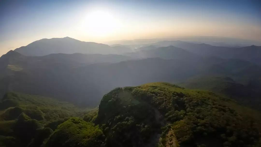 Free Premium Stock Photos Sunrise Over Misty Mountain Range with Lush Green Forest