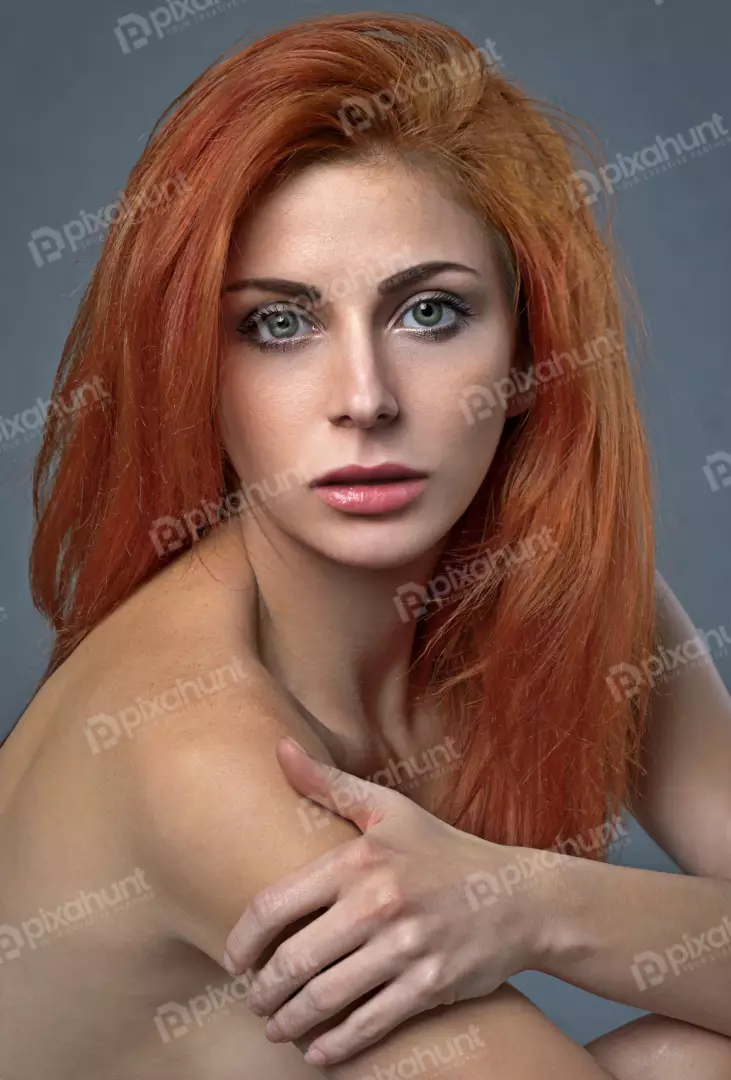 Vibrant Redhead Woman with Green Eyes and Pensive Gaze Portrait