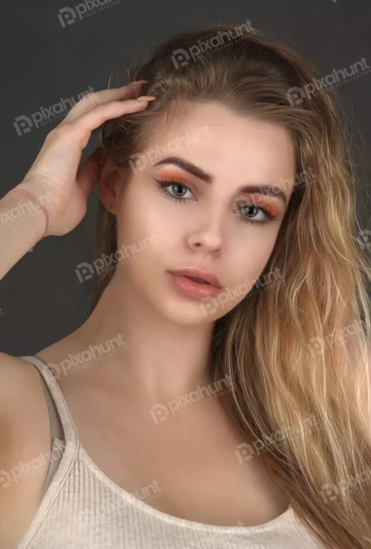 Stunning Young Woman Portrait: Blonde Hair, Green Eyes, Natural Makeup