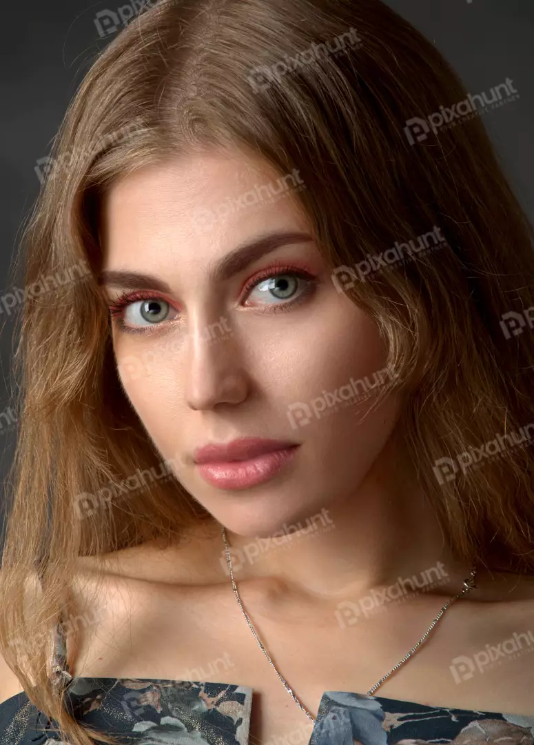 Captivating Young Woman with Long Brown Hair and Mesmerizing Green Eyes