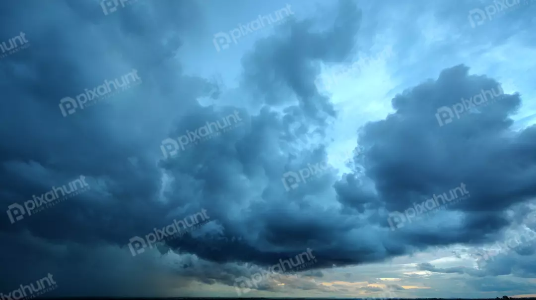 Free Premium Stock Photos Dramatic Dark Storm Clouds Gathering Over the Horizon at Dusk