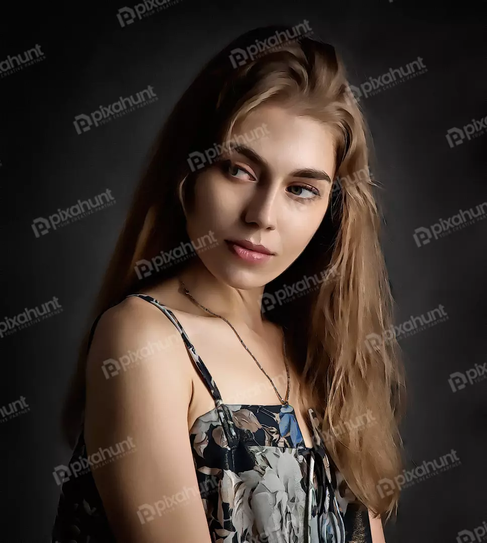 Contemplative Young Woman with Long Blonde Hair in Patterned Dress