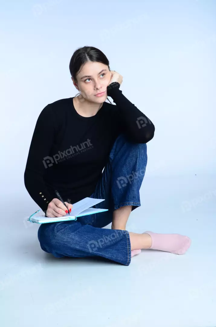 Young Woman Planning Writing on White Background