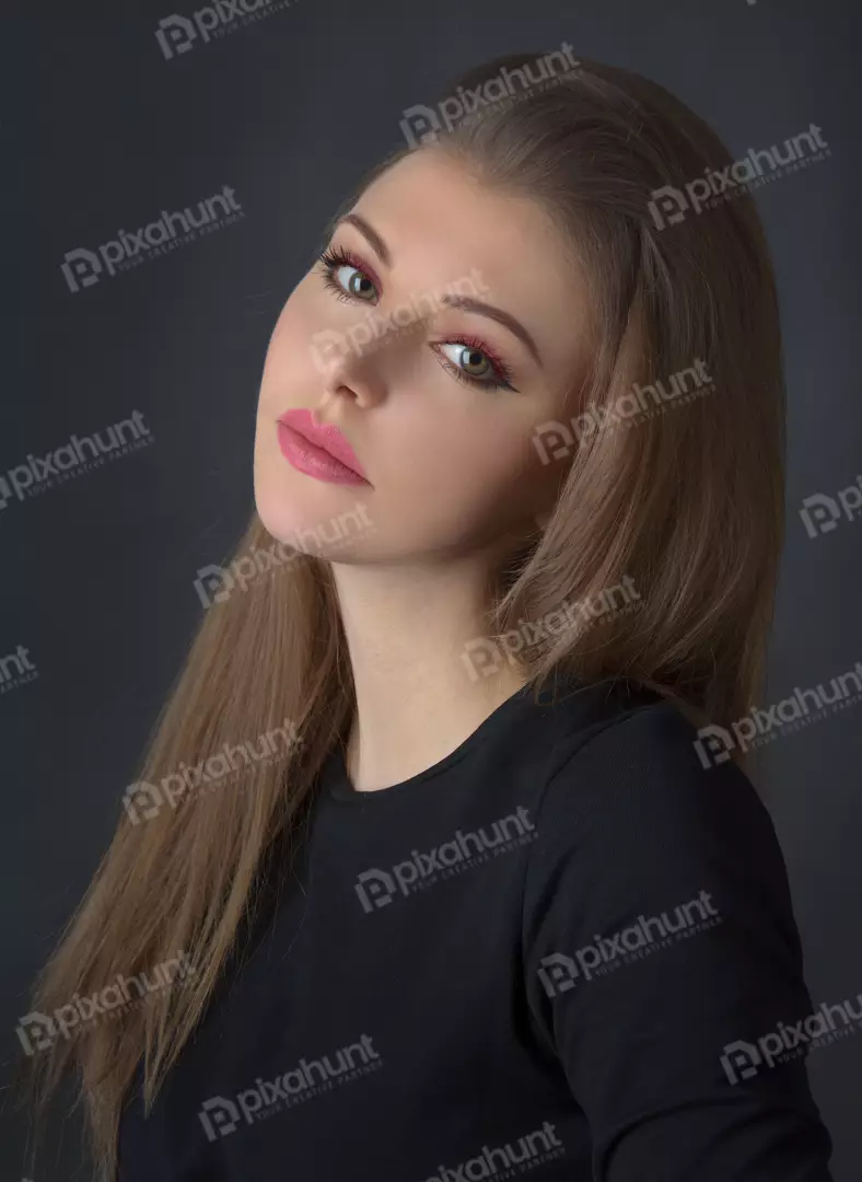 Captivating Woman Portrait with Striking Pink Makeup and Long Hair