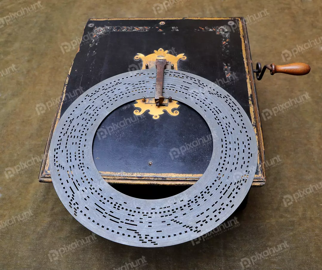 Antique Mechanical Music Box with Perforated Metal Disc Record