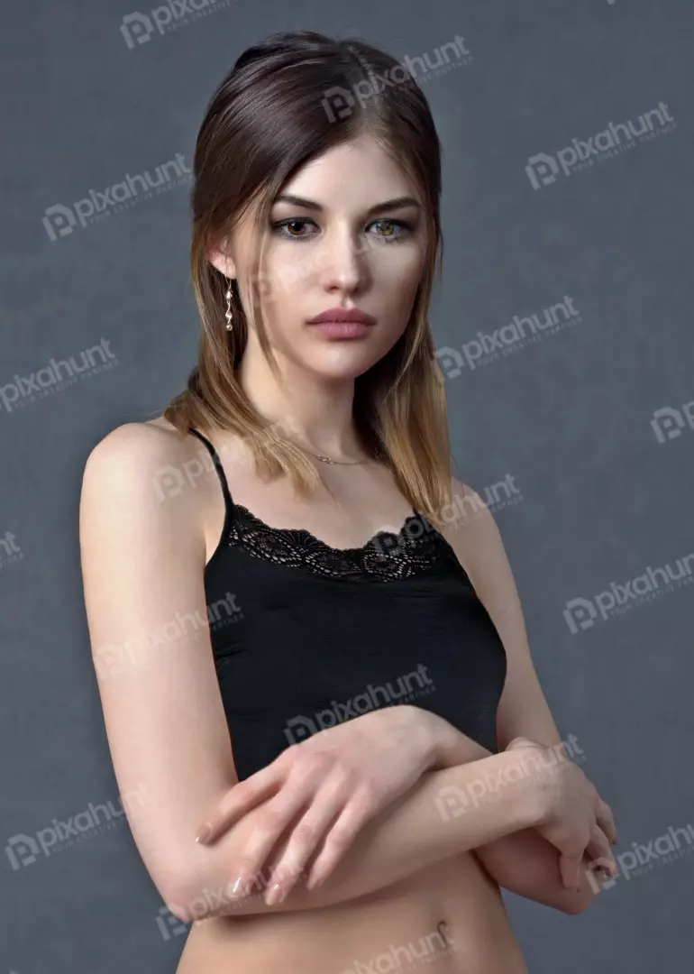 Elegant Young Woman Posing in Black Lace Camisole Studio Portrait