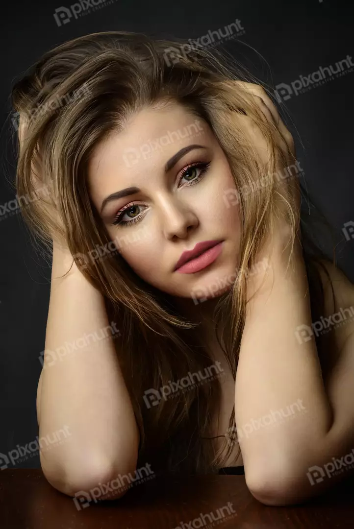 Expressive Woman with Tousled Hair and Striking Green Eyes