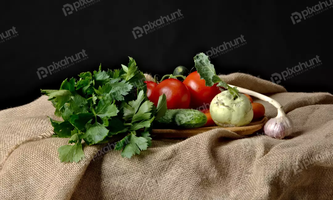 Fresh Organic Vegetables on Rustic Burlap with Dark Background