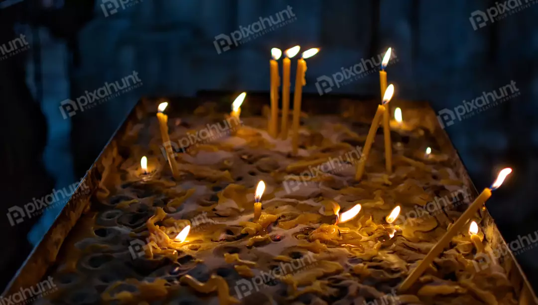 Glowing Prayer Candles, Melted Wax, Sacred Space