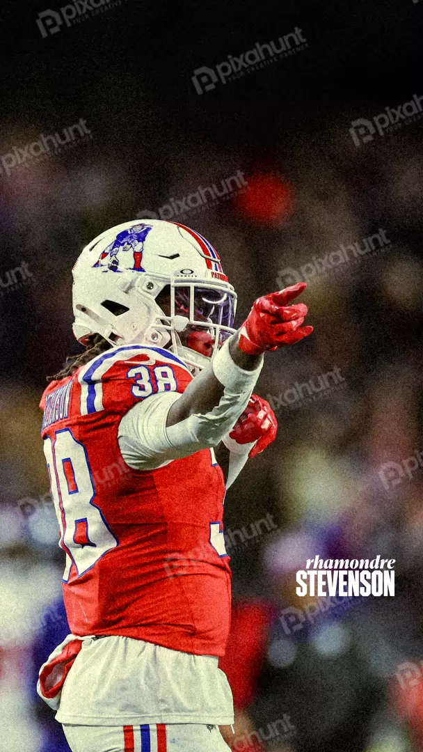 Rhamondre Stevenson Football Player Points During Game on Field