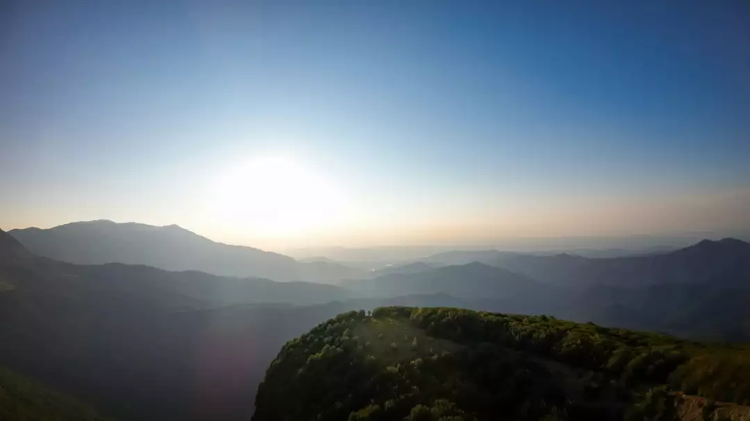 Free Premium Stock Photos Serene mountain landscape at sunrise with a clear blue sky