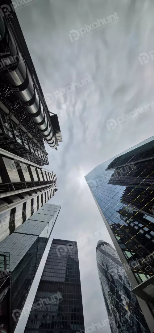 Free Premium Stock Photos Modern London Cityscape with Iconic Skyscrapers Under Cloudy Sky