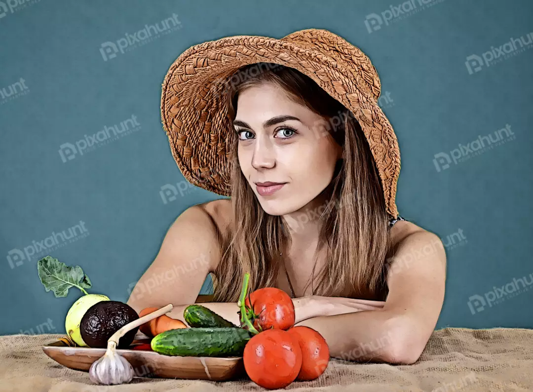Farm Girl in Straw Hat Posing with Organic Garden Vegetable Harvest