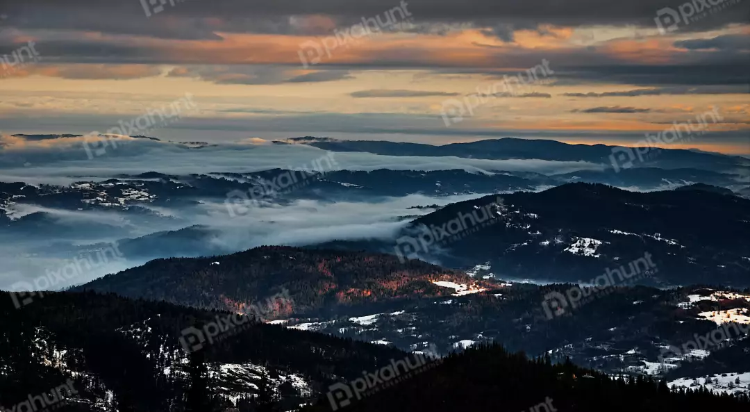 Ethereal Winter Mountain Panorama with Golden Hour Cloud Inversion
