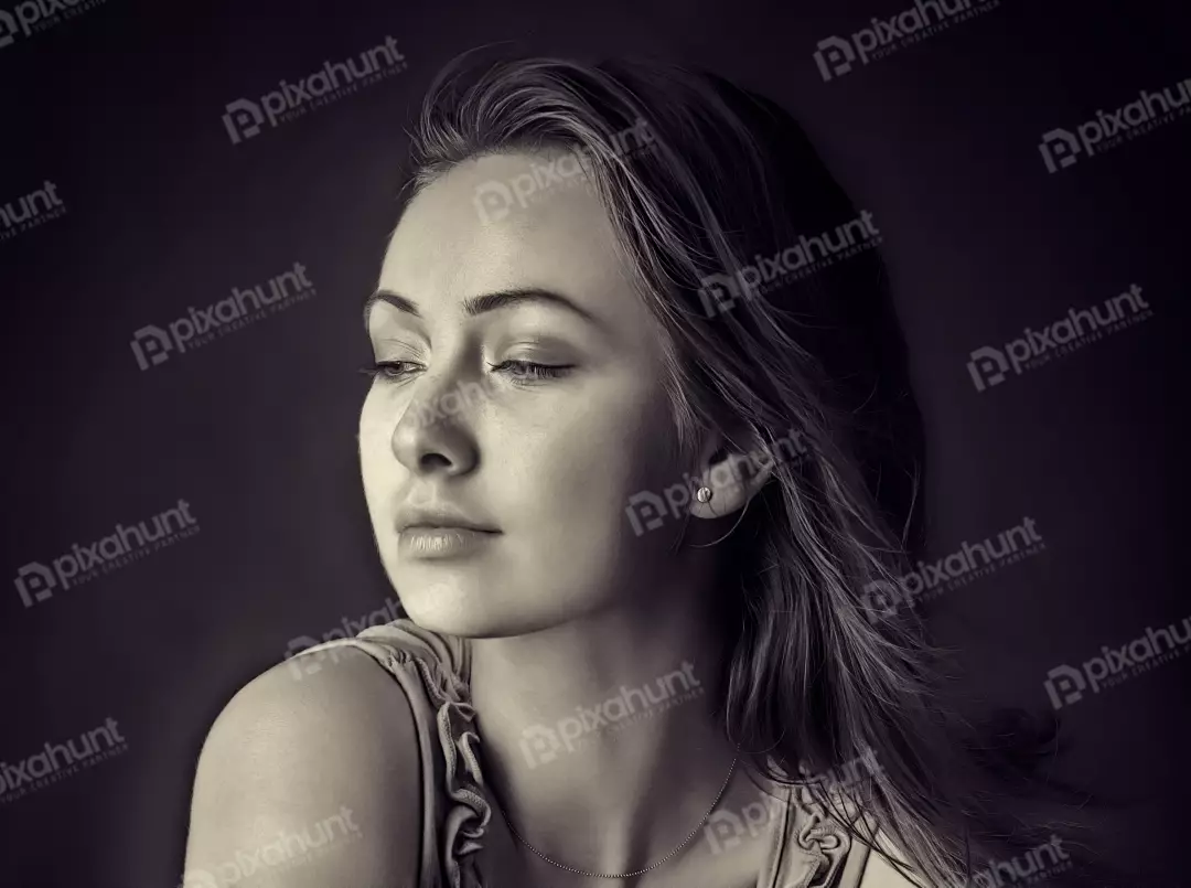 Elegant Monochrome Portrait of Young Woman with Pensive Gaze