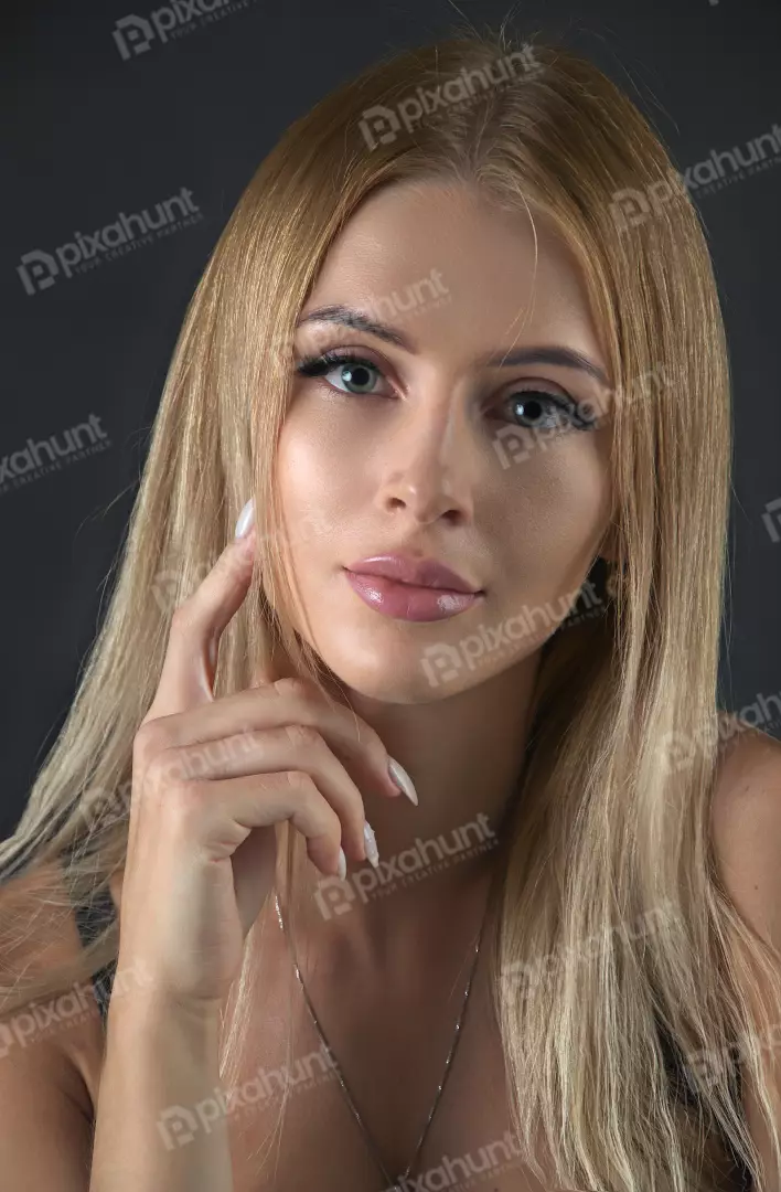 Captivating Blonde Woman with Green Eyes and Radiant Expression Portrait
