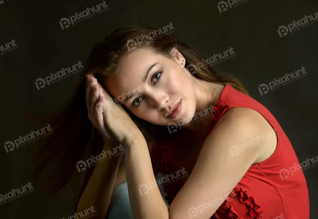 Portrait of Young Woman with Clasped Hands and Serene Gaze