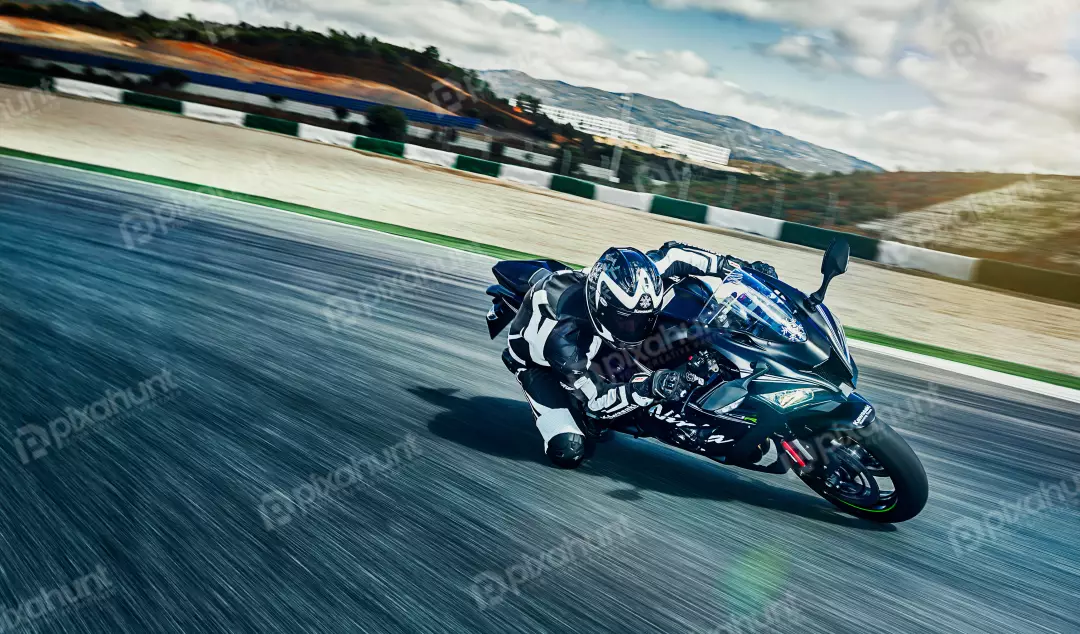 Free Premium Stock Photos Professional Motorcycle Racer Leaning into a ...
