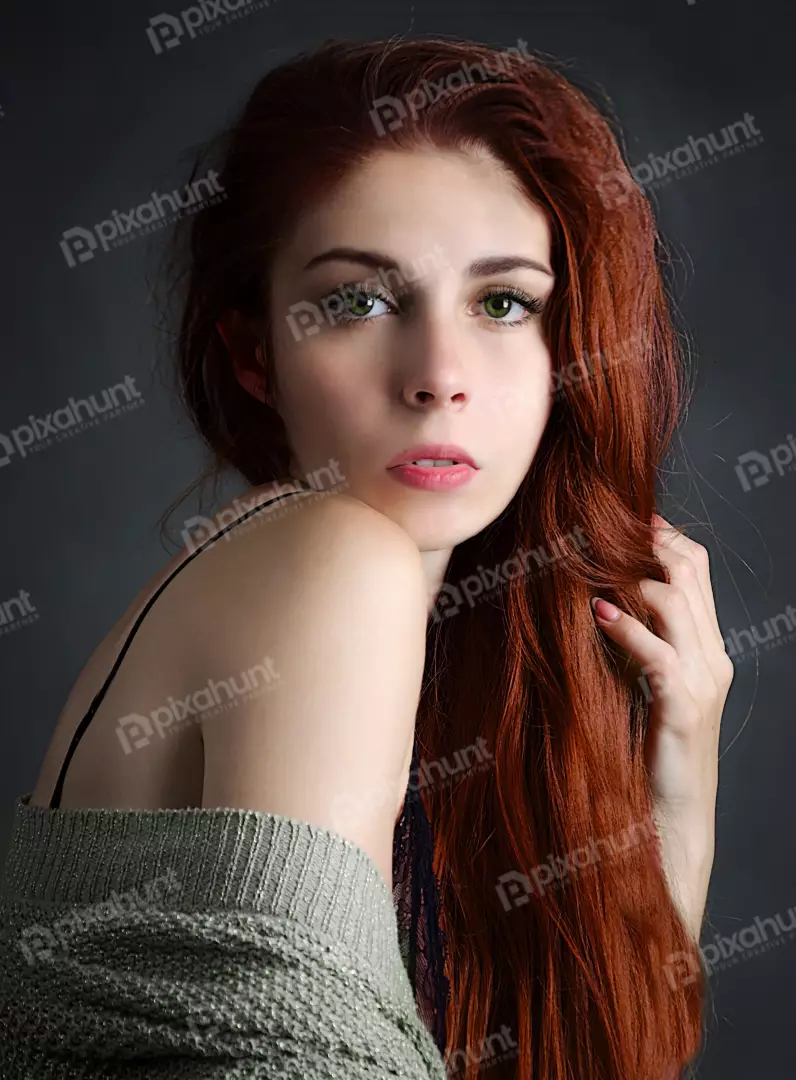 Elegant Redhead Portrait with Green Eyes and Flowing Auburn Hair