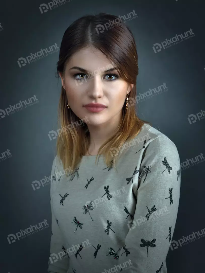 Elegant Woman with Dragonfly Patterned Sweater and Expressive Eyes