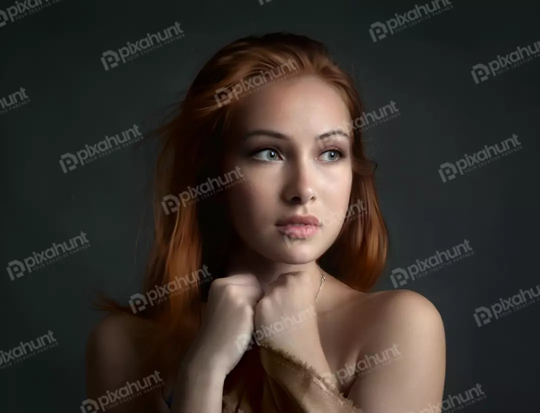 Serene Redhead Woman with Clasped Hands, Pensive Gaze