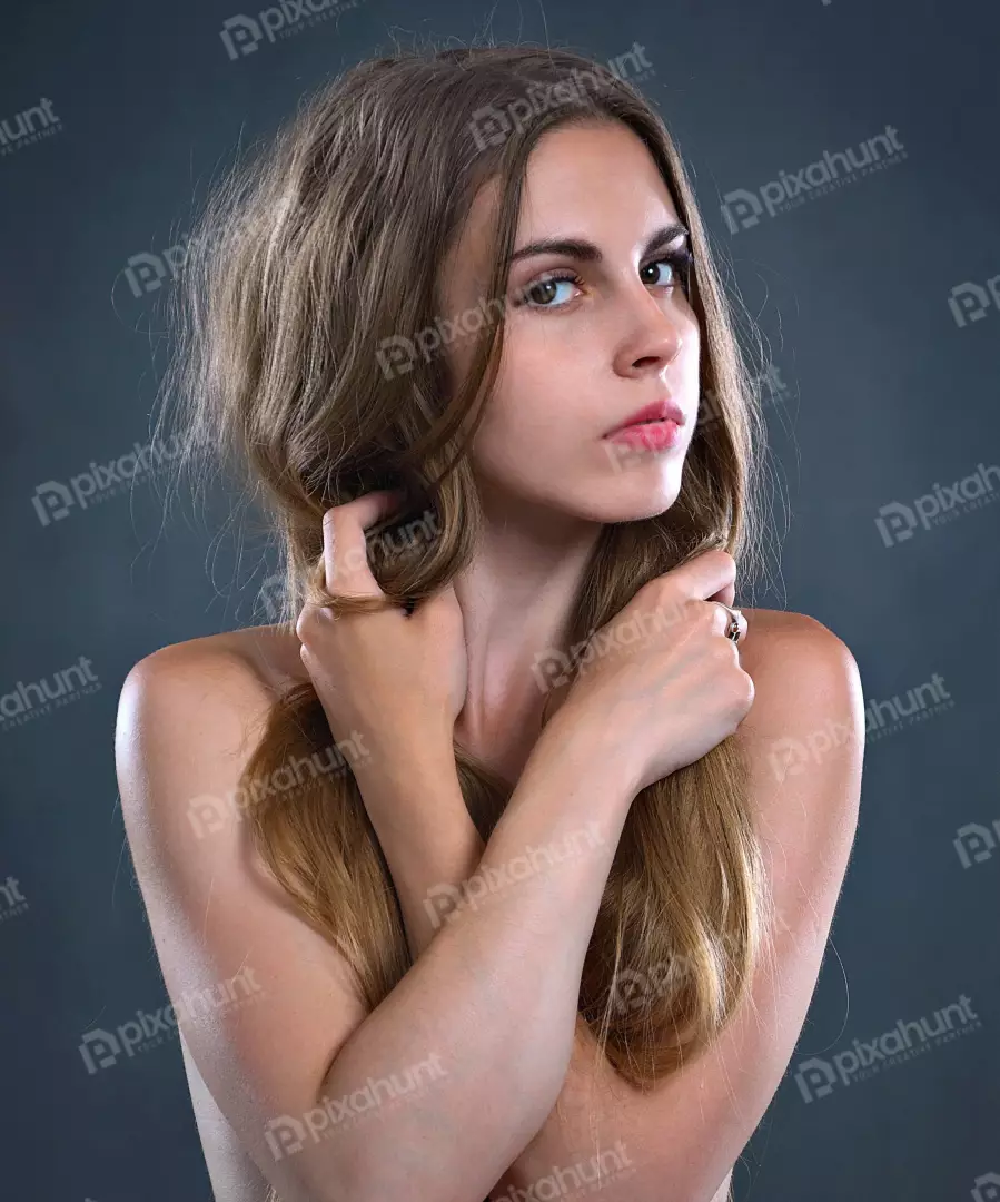 Beautiful Young Woman with Natural Wavy Hair and Modest Pose