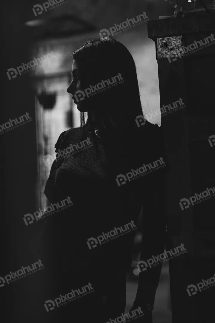 Free Premium Stock Photos Pensive Woman in Dramatic Light