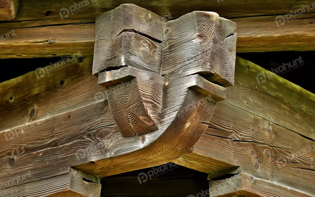 Rustic Wooden Corner Joint with Intricate Grain Patterns from an Aged Timber Structure