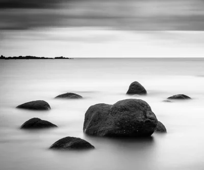 beautiful black and white landscape of a rocky beach