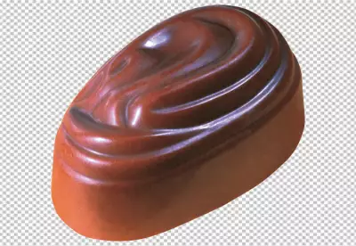 Chocolates dropping into liquid cacao chocolate