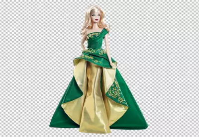 Barbie doll wearing a green and gold dress