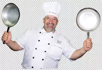 Professional male chef cook in white uniform and cook hat holding transparent background 
