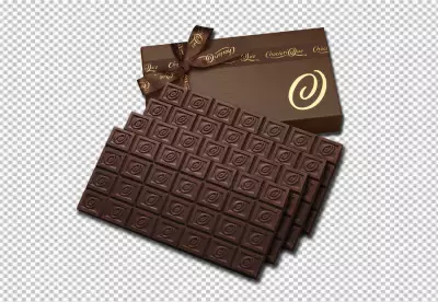 dark chocolate pieces are isolated on a transparent  background