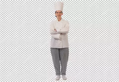 Female chef standing with crossed arms in white uniform and looking nice