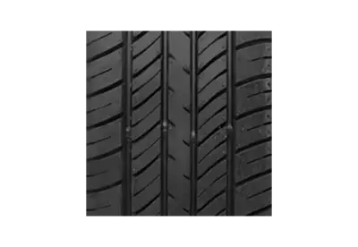 Thunderer Mach R201 tire close up pattern | Close-up of tire against black 
