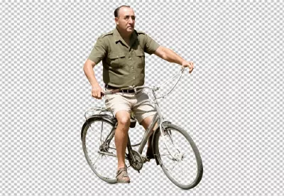 Mature Man in Khaki Shirt Riding Vintage Bicycle on White Background image