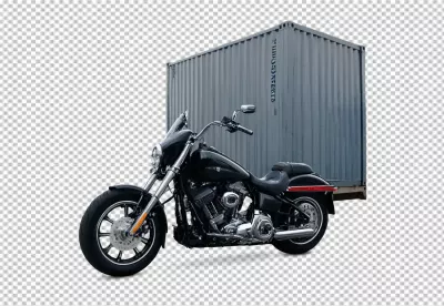 Sleek Black Cruiser Motorcycle with Chrome Accents Against Shipping Container image