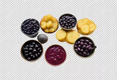 Vibrant Assortment of Fresh Purple Berries, Exotic Fruit Slices, and Delicious Puree image