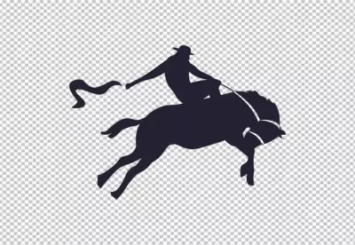Silhouette of Cowboy Riding Across