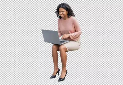 Happy Young Woman Confidently Typing on Laptop for Remote Work or Study image
