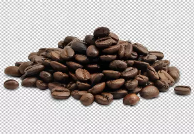 A bunch of coffee beans are on a checkered background