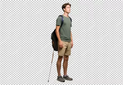 Focused Young Man with Backpack and Trekking Pole Ready for Outdoor Adventure image